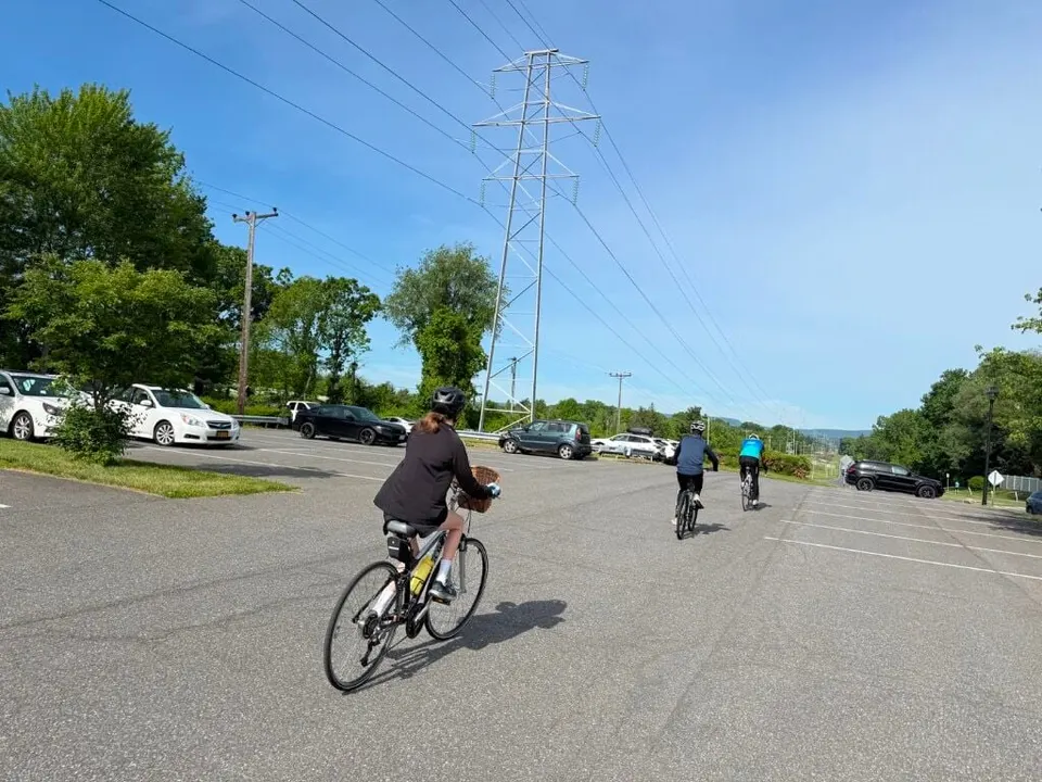 Scouts on bikes setting out on a 25-mile training ride